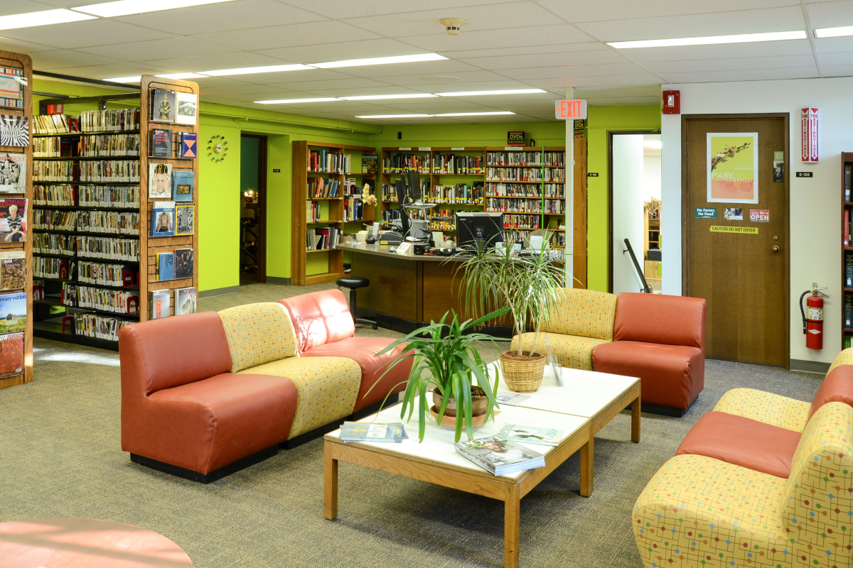 A view of Art & Music library near a community seating area, looking at the circulation 
