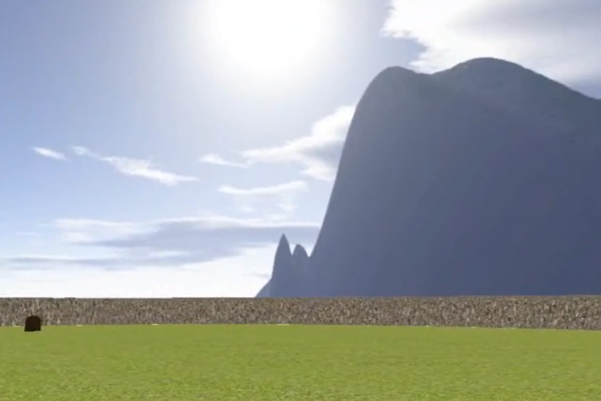 VR scene of a meadow and mountain.