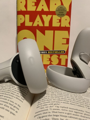 VR controllers on top of open book.