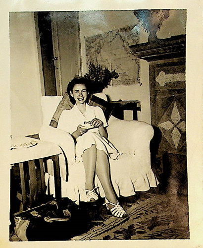 Joan Bondurant, seated, having coffee after dinner in New Delhi
