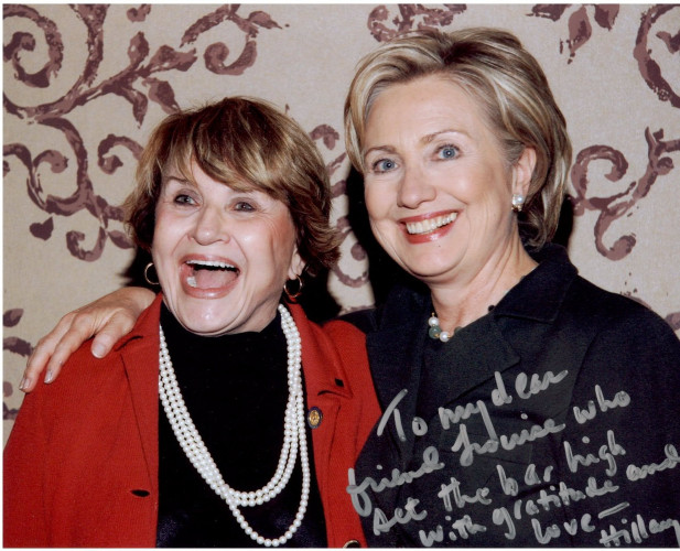 Louise Slaughter with Hilary Clinton posing with large smiles for the camera