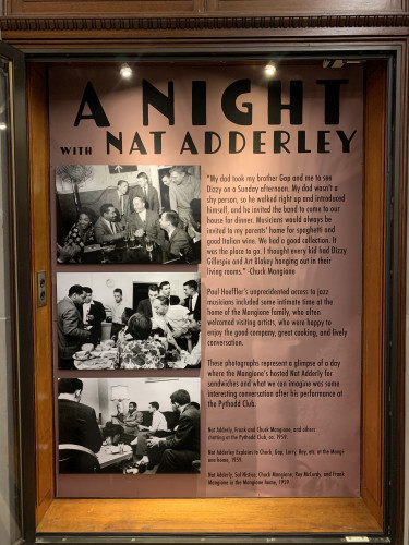 "A Night with Nat Adderley" exhibit case with 3 photographs and text 