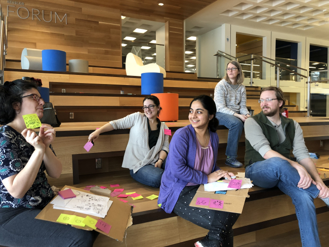 Various library professionals in a session in iZone