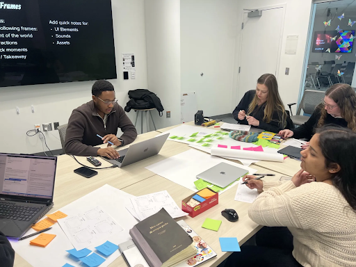people collaborating at a table. 