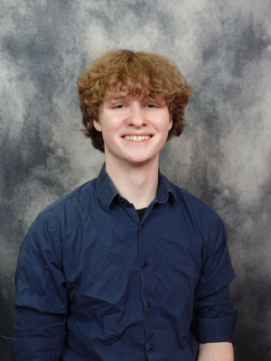 Evan Schmidt smiling for camera
