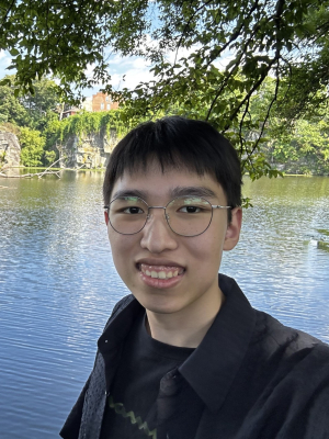 Spencer Ahn in front of a pond.
